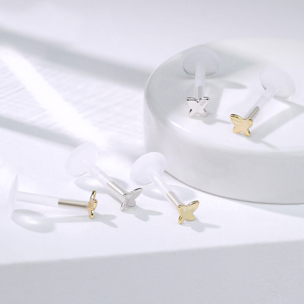 Labret met 14kt witgouden vlinder op BioFlex – geschikt voor oorpiercing. Collectiefoto.