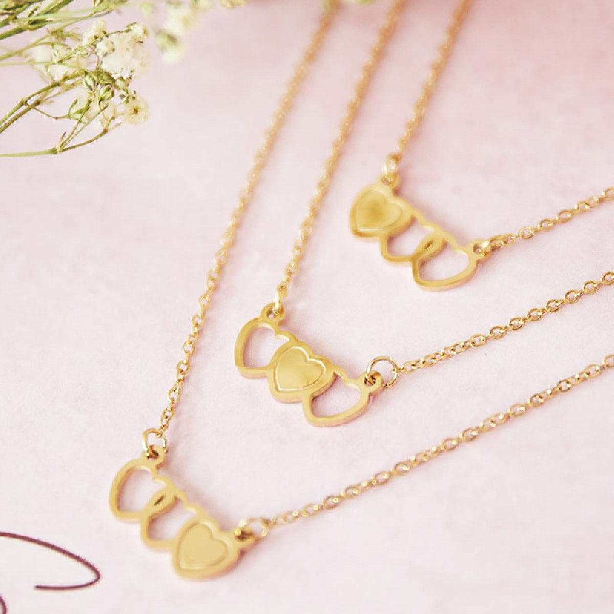 Conjunto de collares para hermanas con corazones en color plata