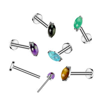 Collectiefoto Zilverkleurige labret met ronde amethist steen van titanium – geschikt voor oorpiercing.