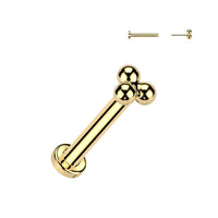 Goudkleurige titanium labret met drie bolletjes – geschikt voor helix of tragus.