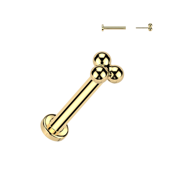 Goudkleurige titanium labret met drie bolletjes – geschikt voor helix of tragus.