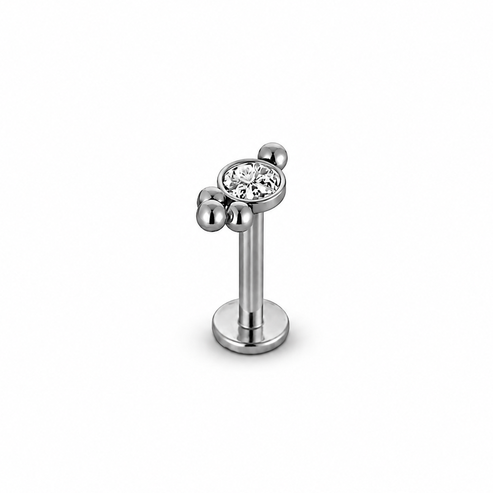 Deze Labret met Kristal & Dots Top is Zilverkleurig Chirurgisch Staal geeft je oor een stijlvolle touch | Lotuspiercings.nl