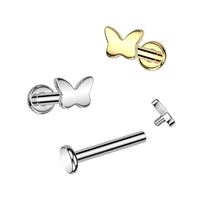 Goudkleurige titanium labret met vlindervorm – voor helix of tragus. Collectiefoto.