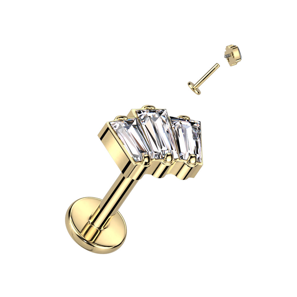 Goudkleurige labret met baguette-steen, gemaakt van titanium – geschikt voor oor- of lippiercing.