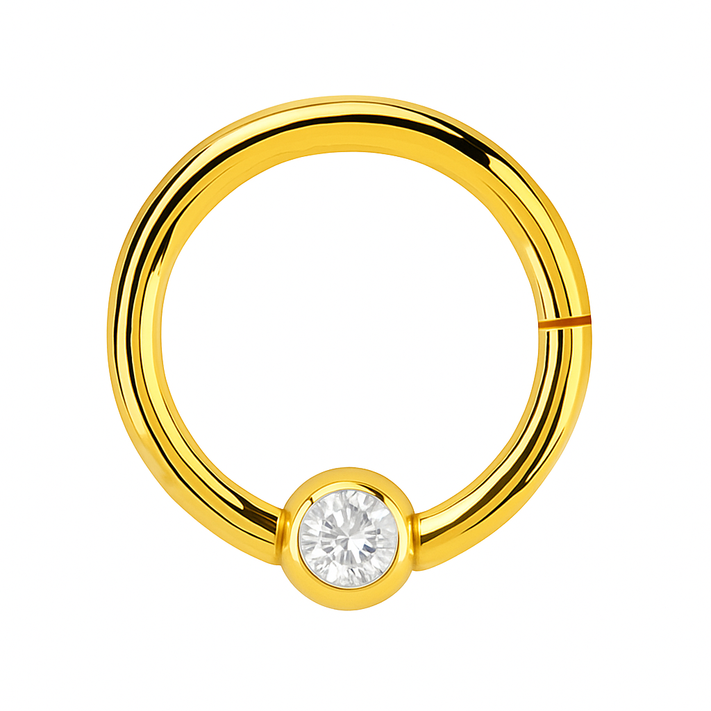 Anillo de clic dorado con circonitas pequeñas - acero quirúrgico