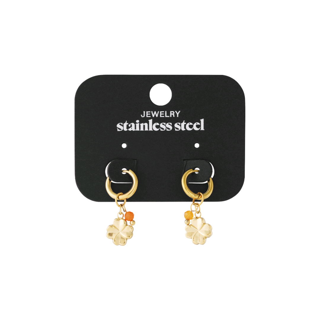 Pendientes de media flor dorados. No disponible.