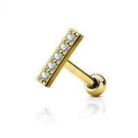 Goudkleurige barbell piercing van chirurgisch staal met goldplated afwerking en bar met zirconia. Geschikt voor oorpiercings met minimalistisch design en subtiele glans.