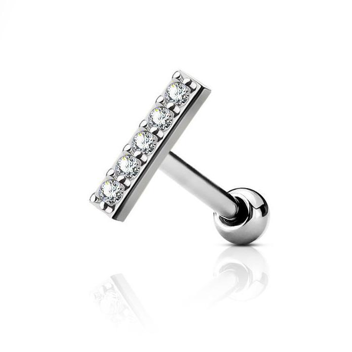 Zilverkleurige barbell piercing van chirurgisch staal met brass afwerking en bar met zirconia. Geschikt voor oorpiercings met minimalistisch design en subtiele glans.